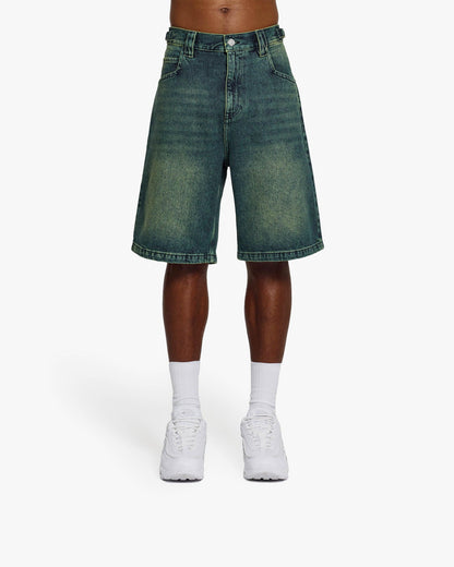 GREEN TINTED DENIM JORTS