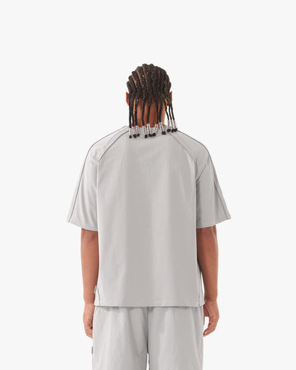 TRACK TEE GREY